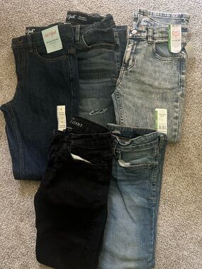 5 pairs of Boys jeans size 8